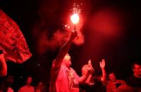 Premier League - Liverpool fans celebrate winning the Premier League