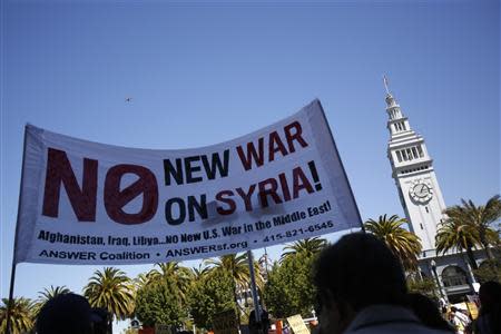 Demonstrators rally during an anti-war rally in San Francisco, California September 7, 2013. REUTERS/Stephen Lam