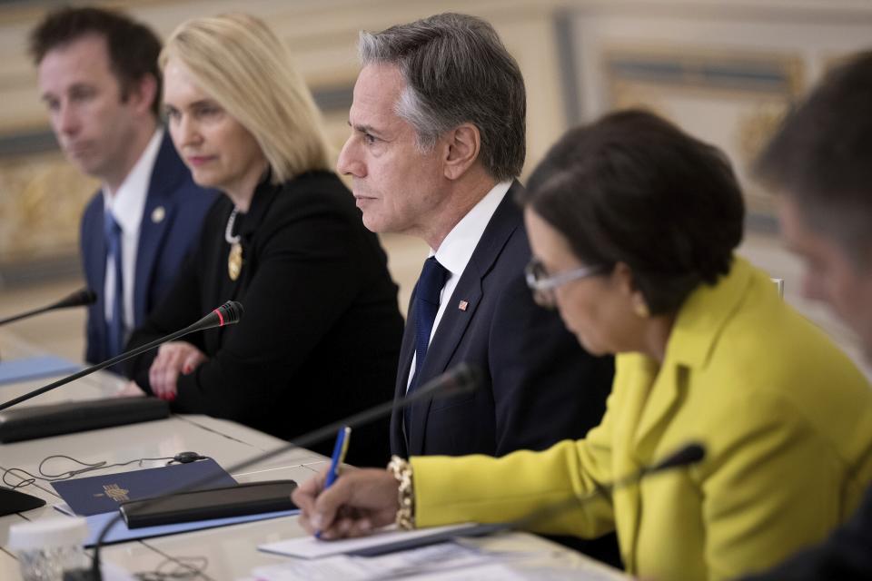 U.S. Secretary of State Antony Blinken, center, attends a meeting with Ukraine's President Volodymyr Zelenskyy in Kyiv, Ukraine, Tuesday, May 14, 2024. Blinken arrived in Kyiv on Tuesday in an unannounced diplomatic mission to reassure Ukraine that it has American support as it struggles to defend against increasingly intense Russian attacks. (Brendan Smialowski/Pool Photo via AP)