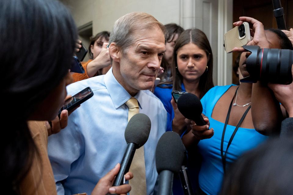 Jim Jordan, R-Ohio, speaks to reporters after departing from a GOP caucus meeting working to formally elect a new speaker of the House in Washington on Oct. 13, 2023.