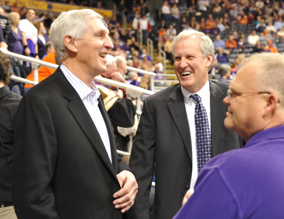 Former University of Evansville coach Jim Crews (center) shares a laugh with former Aces great Jerry Sloan (left) before UE played Illinois State during the last regular-season home game at Roberts Stadium on Feb. 26, 2011. The Aces won, 73-67.