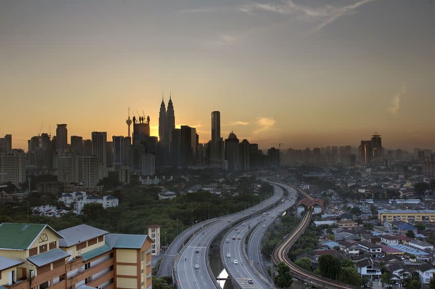 Kuala Lumpur Skyline with Highway at Sunset