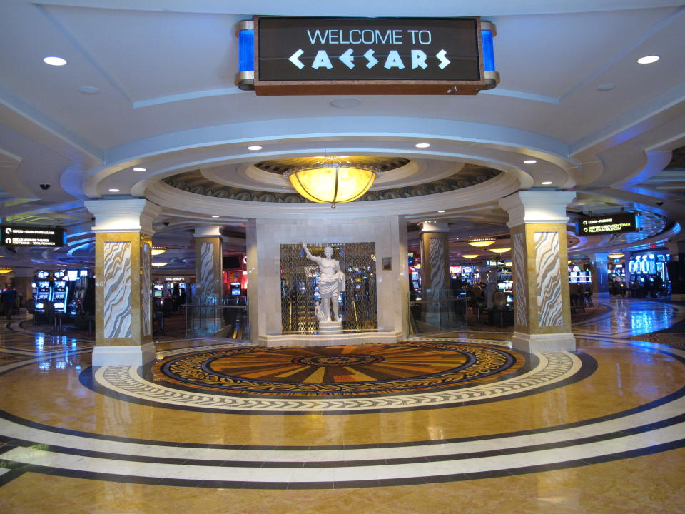 This April 1, 2015 photo shows an entrance to the Caesars casino in Atlantic City, N.J. Figures released Tuesday April 14, 2015 show Caesars experienced a 4.1 decrease in its March casino revenue, to $23.2 million. (AP Photo/Wayne Parry)