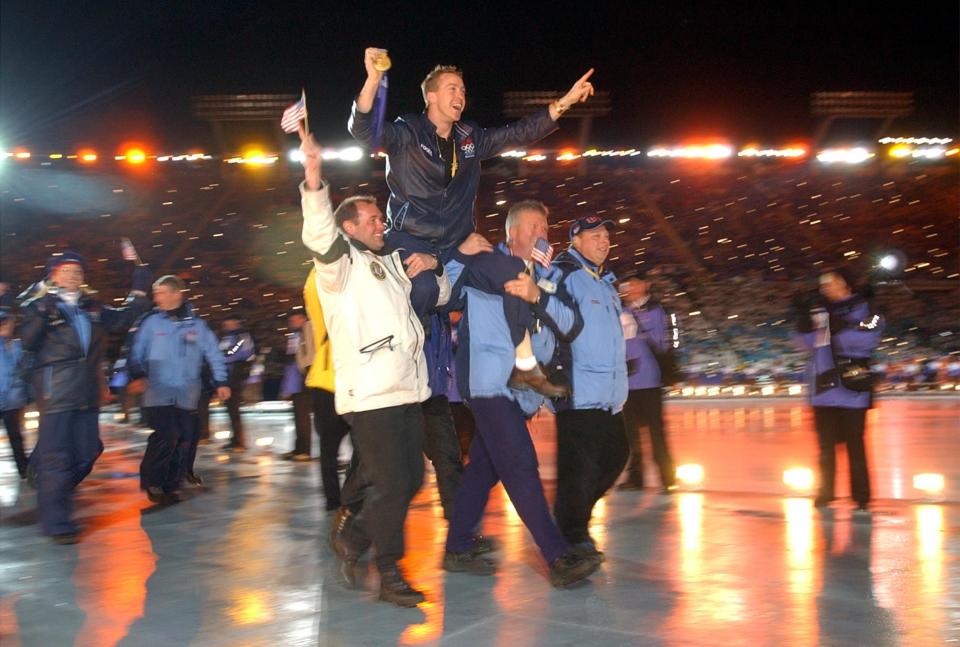 Gold medalist Jim Shea is carried into the stadium during the Salt Lake 2002 Winter Games closing ceremonies at the University of Utah’s Rice-Eccles Stadium on Sunday, Feb. 24, 2002. | Jeffrey D. Allred, Deseret News