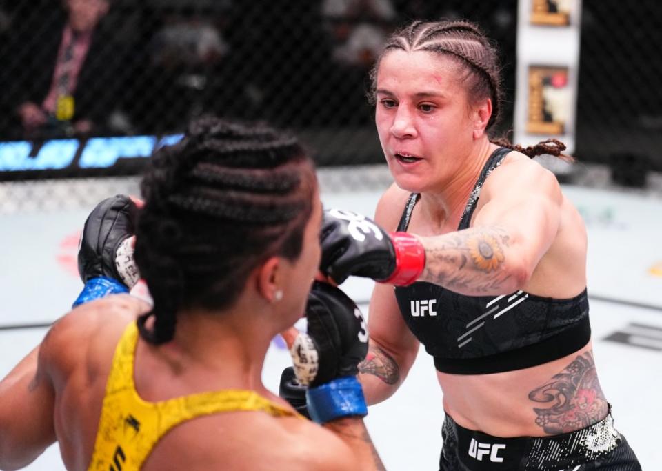 LAS VEGAS, NEVADA – OCTOBER 14: (R-L) Jennifer Maia of Brazil punches Viviane Araujo of Brazil in a flyweight fight during the UFC Fight Night event at UFC APEX on October 14, 2023 in Las Vegas, Nevada. (Photo by Chris Unger/Zuffa LLC via Getty Images)