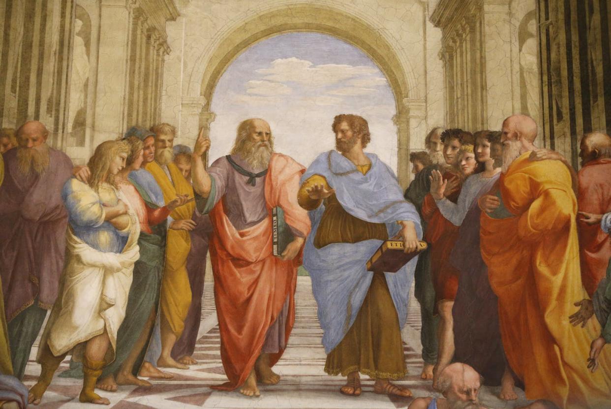 Aristotle (center), wearing a blue robe, seen in a discourse with Plato in a 16th century fresco, 'The School of Athens' by Raphael. <a href="https://www.gettyimages.com/detail/photo/the-school-of-athens-detail-of-a-mural-by-raphael-royalty-free-image/538198840" rel="nofollow noopener" target="_blank" data-ylk="slk:Pascal Deloche/Stone via Getty Images;elm:context_link;itc:0;sec:content-canvas" class="link ">Pascal Deloche/Stone via Getty Images</a>