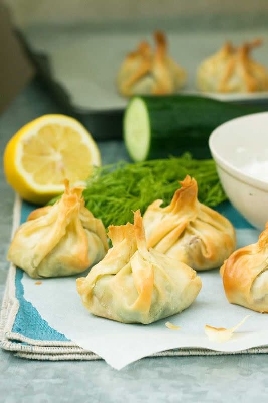 <p>Scrummy Lane</p><p>Your Friendsgiving crew is going to love these cute little Greek filo parcels stuffed with lovely Mediterranean flavors including spinach, feta cheese, dill and sun dried tomatoes.</p><p><strong>Get the recipe:</strong><a href="https://scrummylane.com/greek-filo-parcels-with-tzatziki/" rel="nofollow noopener" target="_blank" data-ylk="slk:Greek Filo Parcels with Tzatziki;elm:context_link;itc:0;sec:content-canvas" class="link "><strong> Greek Filo Parcels with Tzatziki</strong></a></p>