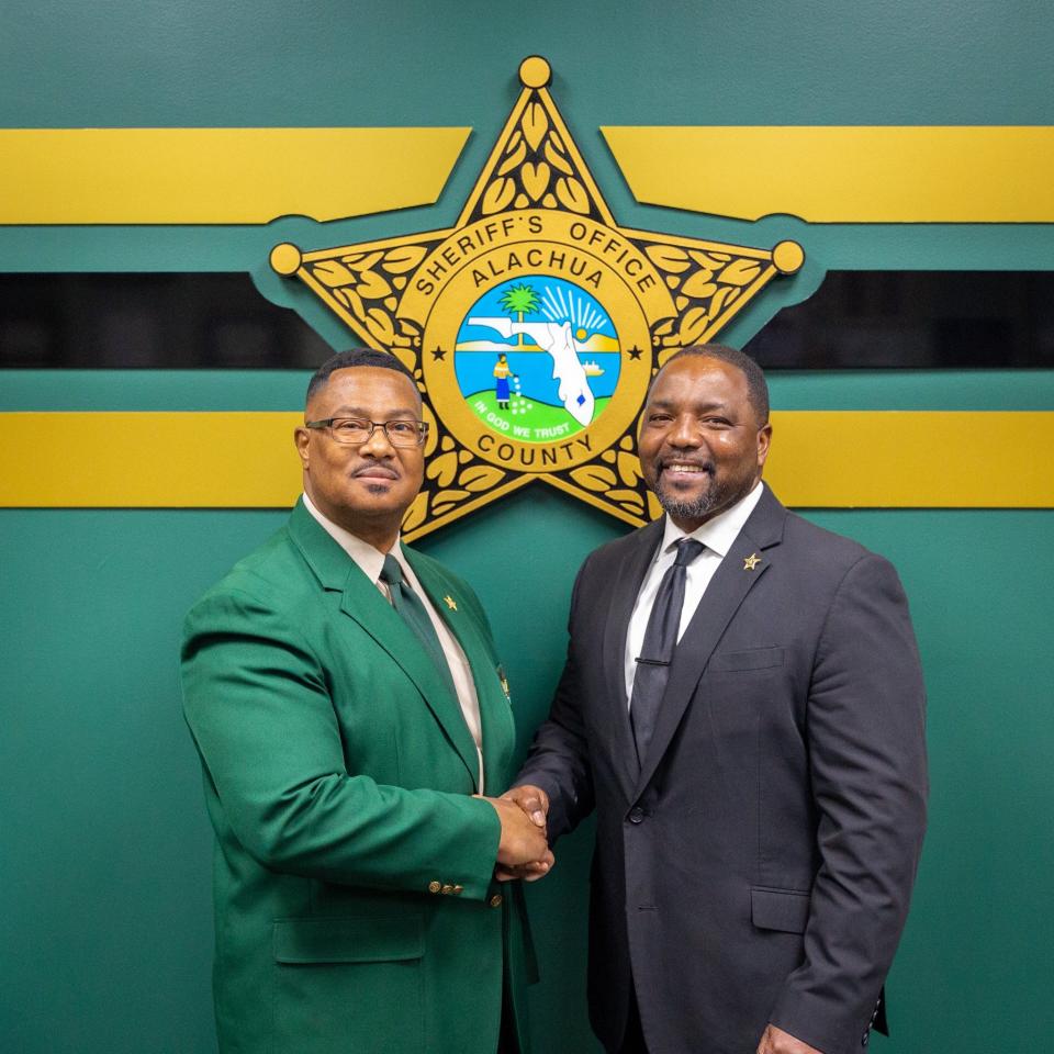 Sheriff Clovis Watson Jr., left, and Col. Chad Scott pose for a photo that was used to announce Scott's promotion on the Alachua County Sheriff's Office's Facebook page on Aug. 11, 2022.