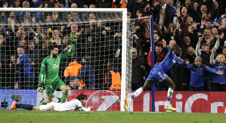 Chelsea's Demba Ba celebrates after scoring his side second goal of the game during the Champions League quarterfinal second leg soccer match between Chelsea and Paris Saint Germain at Stamford Bridge stadium in London, Tuesday, April 8, 2014. (AP Photo/Matt Dunham).