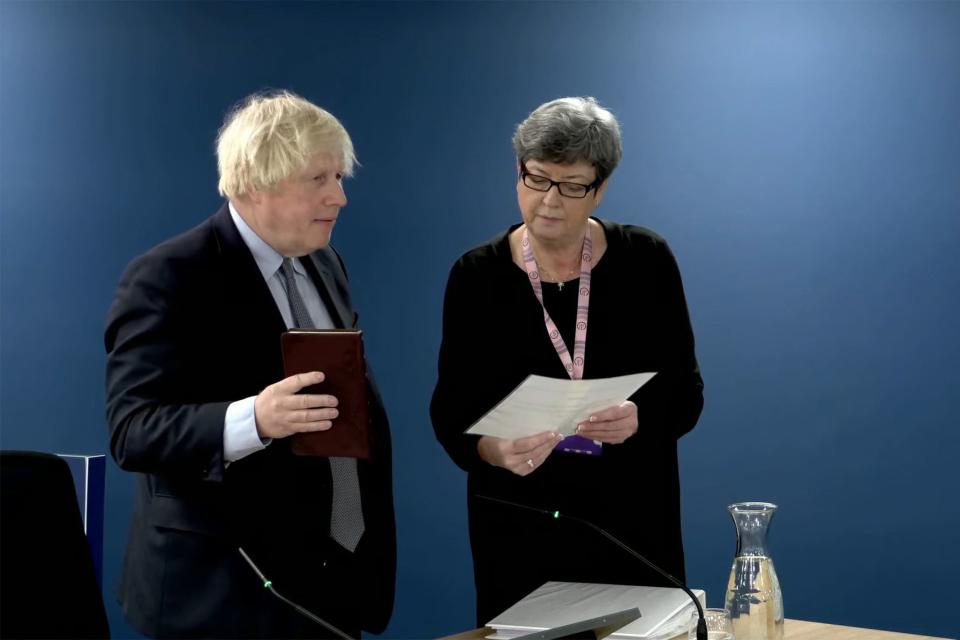 Former prime minister Boris Johnson being sworn in ahead of giving evidence at the Covid Inquiry (UK Covid-19 Inquiry/PA)