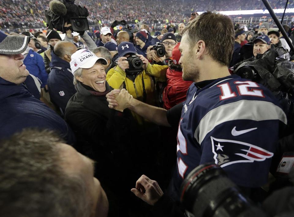 txgdgb jon bon jovi congratulates with new england patriots tom brady on the field after the game against the pittsburgh steelers in the afc championship game at gillette stadium in foxborough, massachusetts on january 22, 2017 the patriots defeated the steelers 36 17 and advance to play the nfc champion atlanta falcons in super bowl li in houston texas photo by john angelillo upi