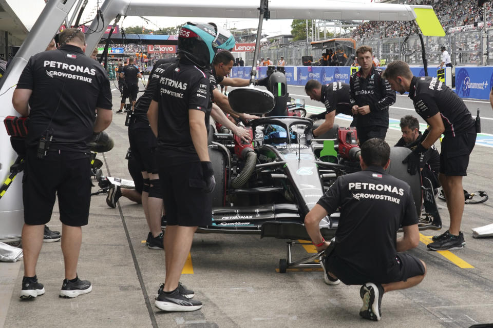 Mercedes driver George Russell of Britain gets a pit service during the second practice ahead of the Japanese Formula One Grand Prix at the Suzuka Circuit, Suzuka, central Japan, Friday, Sept. 22, 2023. (AP Photo/Toru Hanai)