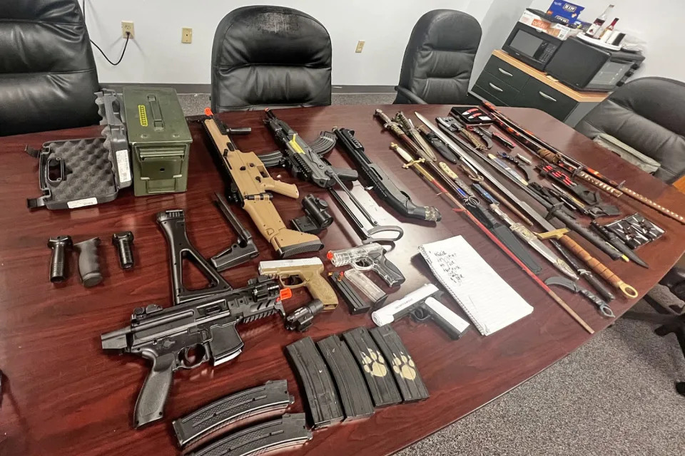 Police in Florida's Volusia County say they recovered airsoft rifles, pistols and fake ammunition along with knives, swords and other weapons, from a middle school student who threatened to commit a school shooting. (Volusia County Sheriff's Office )