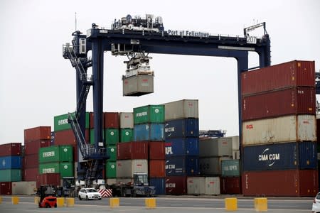 FILE PHOTO: A shipping container is lifted at Felixstowe Port