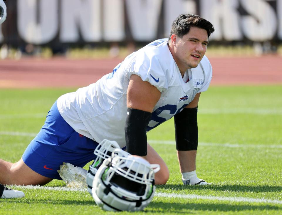 Bills offensive lineman Connor McGovern stretches before that of practice.