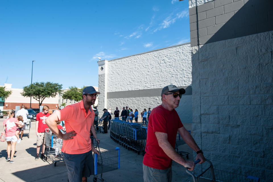 People wait in line to get into Wal-Mart in Katy,&nbsp;Texas on Wednesday.&nbsp; (Photo: Joseph Rushmore for HuffPost)