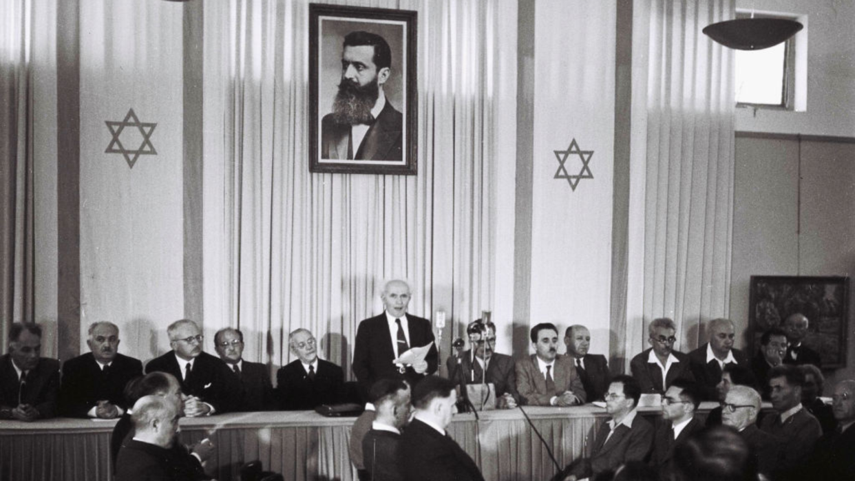   David Ben Gurion, who was to become Israel's first Prime Minister, reads the Declaration of Independence May 14, 1948 at the museum in Tel Aviv, during the ceremony founding the State of Israel. 