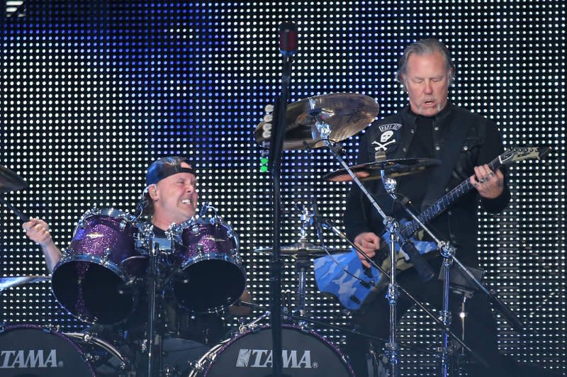 Lars Ulrich (L) and Kirk Hammett of Metallica perform in concert at the Stade de France near Paris on May 12, 2019. Ulrich's father, Torben, beloved by the band's fans, died Thursday at 95. Photo by David Silpa/UPI