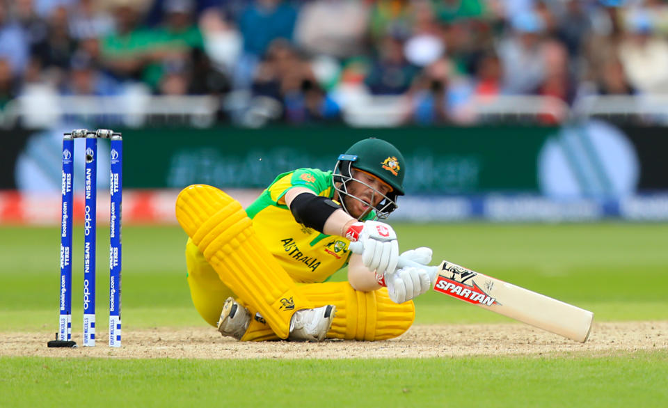 Australia's David Warner goes down after being hit by the ball during the ICC Cricket World Cup group stage match at Trent Bridge, Nottingham. (Photo by Simon Cooper/PA Images via Getty Images)