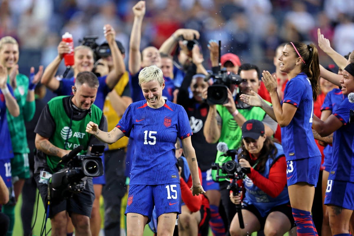 Megan Rapinoe is congratulated after her final game for the United States  (AFP via Getty Images)