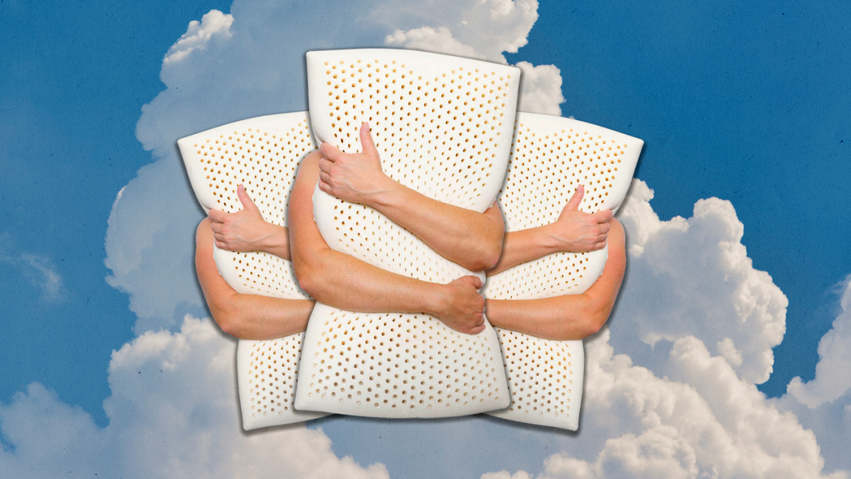 holding a pillow in clouds