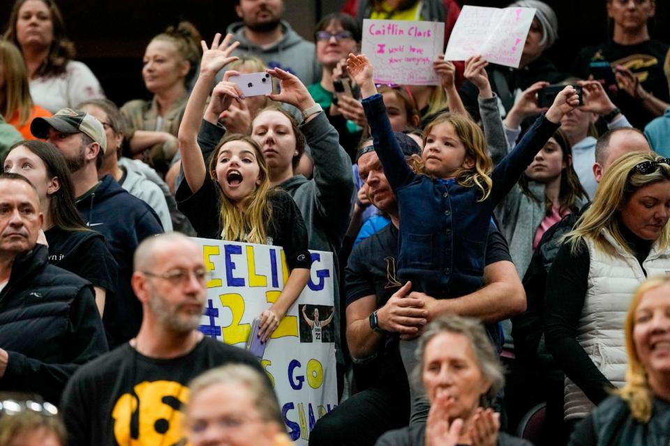 PHOTO: Fans cheer as Iowa takes the court during practice for the NCAA Women's Final Four championship basketball game in Cleveland, OH, April 6, 2024. (Morry Gash/AP)