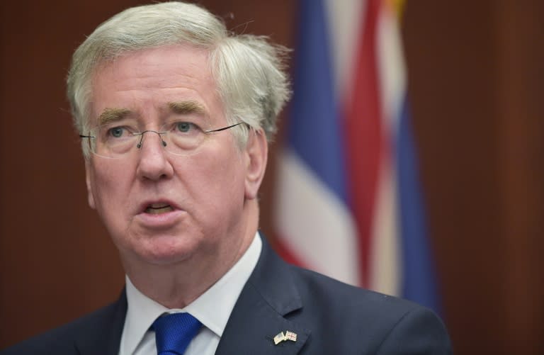 Britain's Defense Secretary Michael Fallon says Britain was justified in killing two British Islamic State jihadists in a drone strike