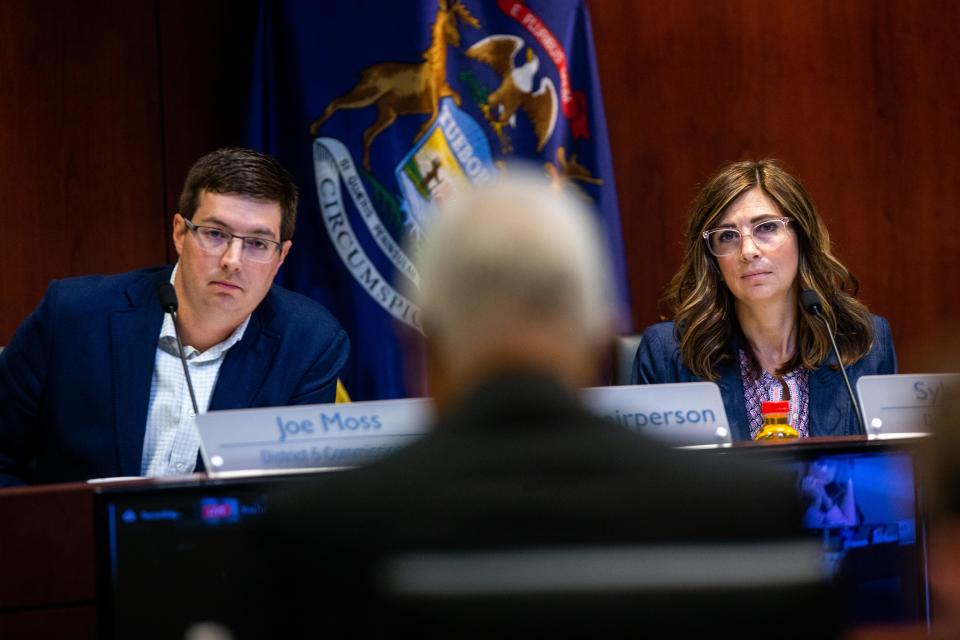 Commissioners Joe Moss (left) and Sylvia Rhodea (right) listen to the legal council Tuesday, Sept. 12, 2023, at the county offices in West Olive.