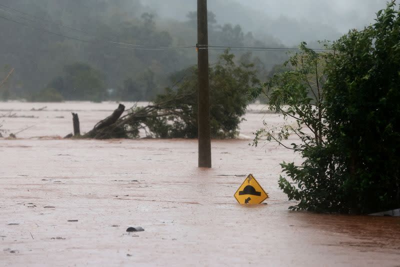 A flooded road is seen near the Taquari River during heavy rains in the city of Encantado in Rio Grande do Sul