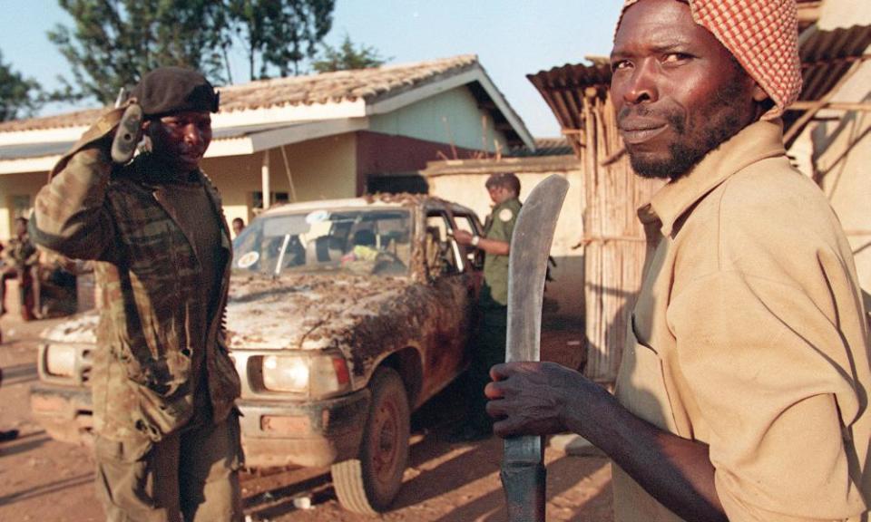 An Interahamwe Hutu militiaman holding a machete in Gitarama, centre Rwanda, 12 June 1994.