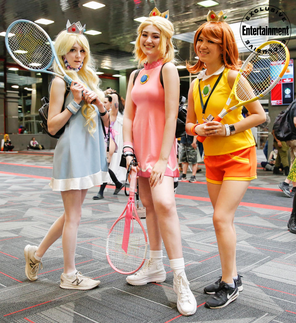 Rosalina, Peach and Daisy from <em>Mario Tennis Aces</em> cosplayers