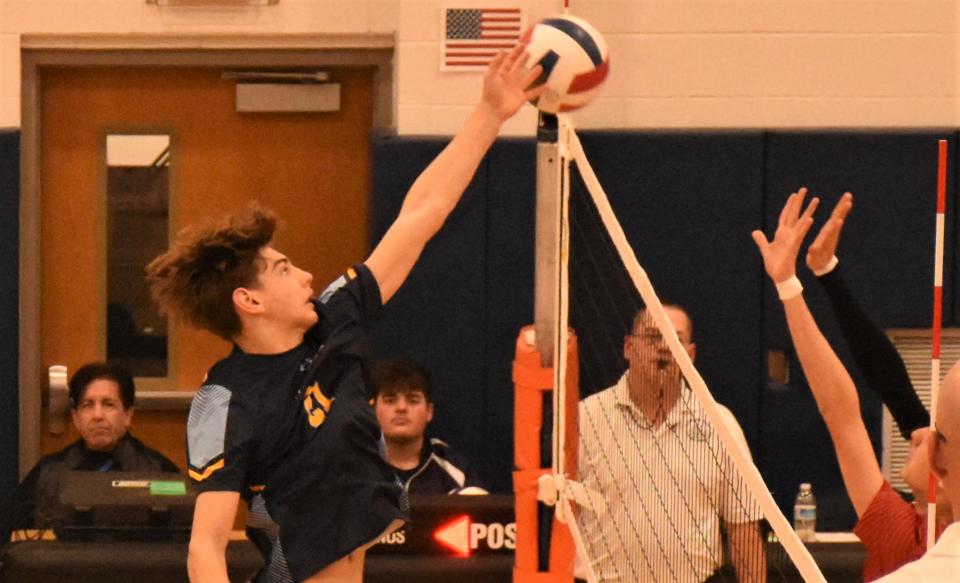 Orion Bliss hits the ball over the net for Central Valley Academy during Thursday's match against Cincinnatus.