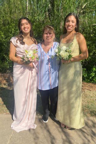 <p>Valerie Rivas</p> Vanessa Rivas, her twin sister Valerie Rivas and their mom Laura Rivas take a photo together on prom day.