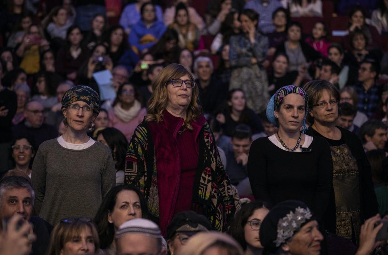 <span class="caption">Opportunities are expanding for Orthodox Jewish women to formally study Jewish texts. This event in Jerusalem celebrated women who completed the 7 1/2-year cycle of daily study of the Talmud.</span> <span class="attribution"><span class="source">AP Photo/Tsafrir Abayov</span></span>