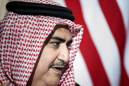 FILE PHOTO: Bahrain's Foreign Minister Sheikh Khalid bin Ahmed al-Khalifa waits for a meeting with John Kerry (unseen) at King Abdulaziz International Airport in Jeddah September 11, 2014. REUTERS/Brendan Smialowski/Pool