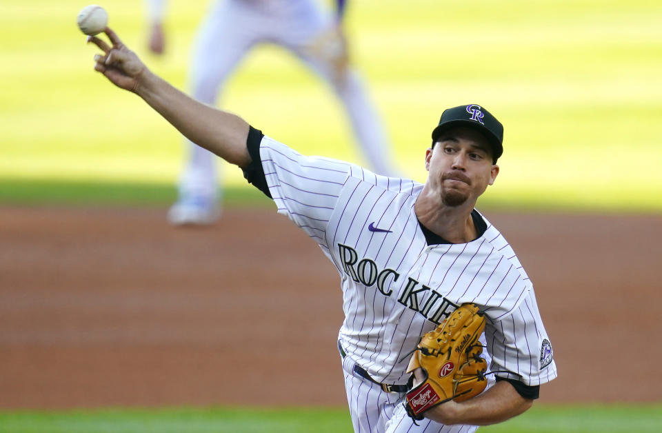 Colorado Rockies starting pitcher Chi Chi Gonzalez throws to the plate against the San Francisco Giants during the first inning of a baseball game Monday Aug. 3, 2020, in Denver. (AP Photo/Jack Dempsey)