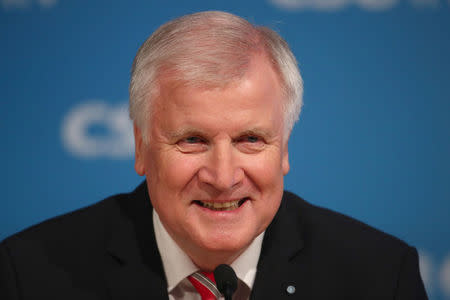 Bavarian Prime Minister and head of the Christian Social Union (CSU) Horst Seehofer arrives for a news conference at the CSU headquarters after a board meeting in Munich, Germany, November 23, 2017. REUTERS/Michael Dalder