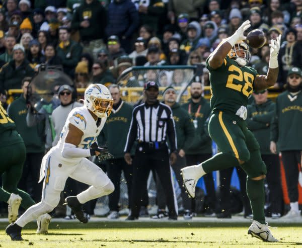 Green Bay Packers running back A.J. Dillon catches a pass against the Los Angeles Chargers on Sunday at Lambeau Field in Green Bay, Wis. Photo by Tannen Maury/UPI