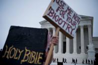 <p>People arrive outside the US Supreme Court before Masterpiece Cakeshop vs. Colorado Civil Rights Commission is heard on Dec. 5, 2017 in Washington. (Photo: Brendan Smialowski/AFP/Getty Images) </p>