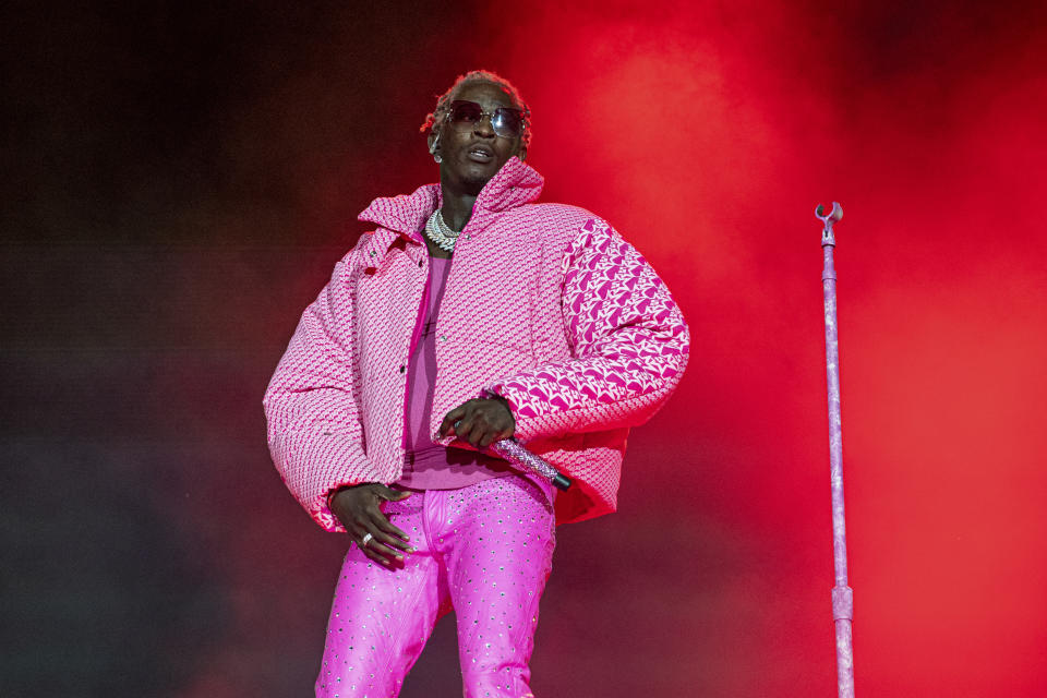CORRECT FIRST NAME TO: JEFFERY, INSTEAD OF JEFFREY FILE - Young Thug performs on day four of the Lollapalooza Music Festival on Sunday, Aug. 1, 2021, at Grant Park in Chicago. The Atlanta rapper, whose name is Jeffery Lamar Williams, was arrested Monday, May 9, 2022, in Georgia on conspiracy to violate the state's RICO act and street gang charges, according to jail records. (Photo by Amy Harris/Invision/AP, File)