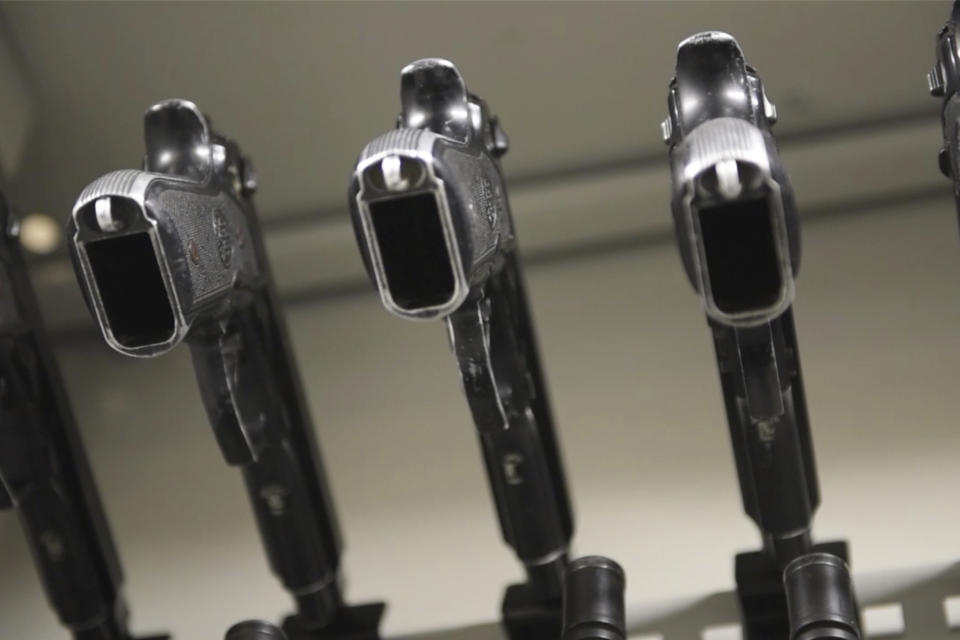 This 2017 image from video made available by the U.S. Air Force shows weapons stored at the Little Rock Air Force Base in Arkansas. Determined to track the whereabouts of their guns, some units of the U.S. Air Force and Army have explored radio frequency identification technology that could let enemies detect American troops on the battlefield, The Associated Press has found. The Marines and Navy told AP they will not put the technology in guns, in part due to security concerns. (Senior Airman Jael Laborn/U.S. Air Force via AP)