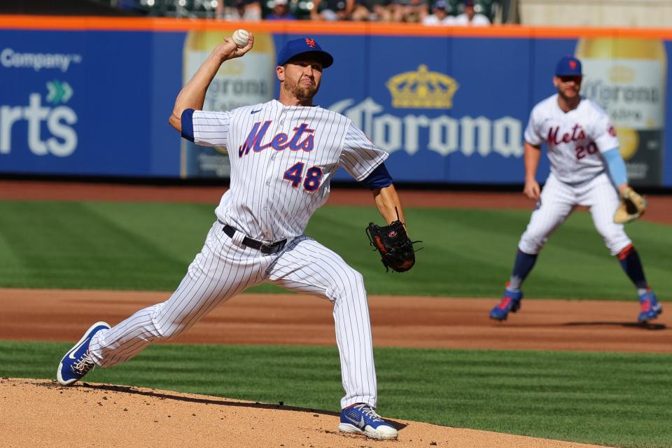 Aug 7, 2022; New York City, New York, USA; New York Mets starting pitcher Jacob deGrom (48) delivers a pitch during the first inning against the Atlanta Braves during the first inning at Citi Field. Mandatory Credit: Vincent Carchietta-USA TODAY Sports