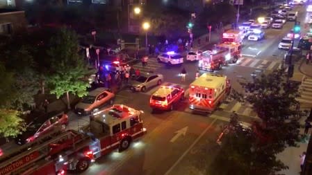 Rescue vehicles are seen following a shooting in Washington