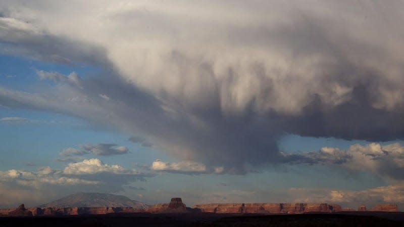 A rain cloud hangs over Lake Powell on June 24, 2021 in Page, Arizona.