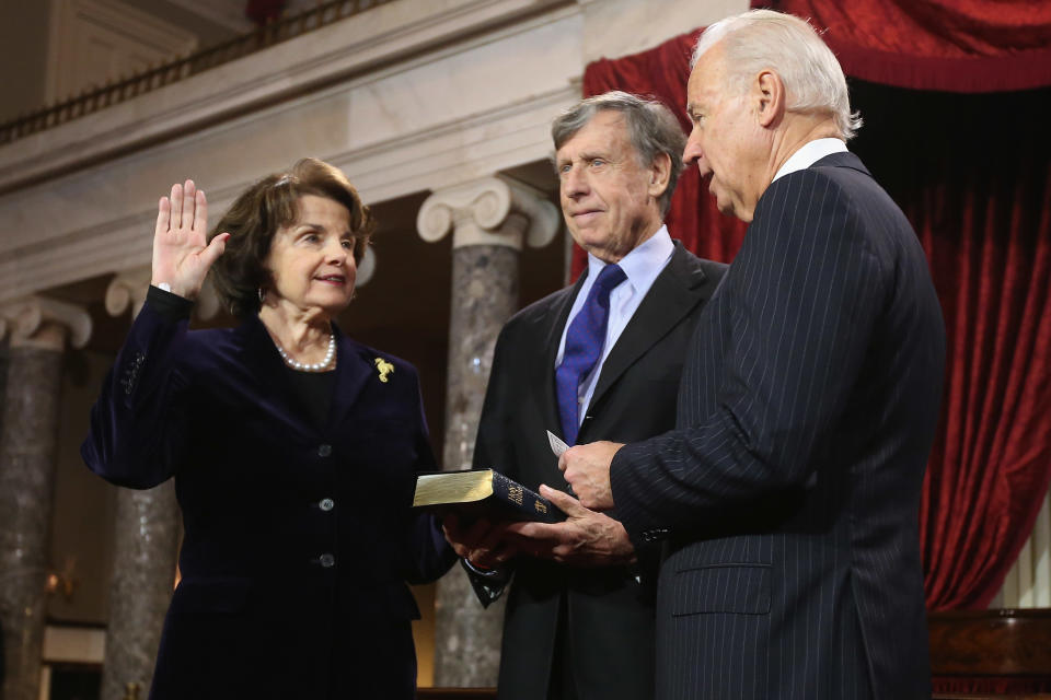 Feinstein, her husband Richard Blum and then-Vice President Joe Biden at her swearing-in ceremony on January 3, 2013.