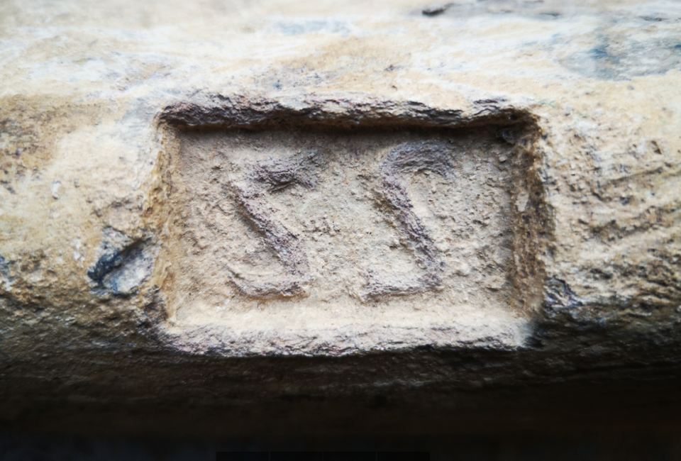 The letters “SS,” referring to the mining company Societas Sisaponensis, is seen on one of the lead bars.
