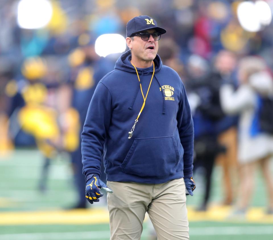 Michigan coach Jim Harbaugh on the field before action against Ohio State on Saturday, Nov. 30, 2019, at Michigan Stadium.