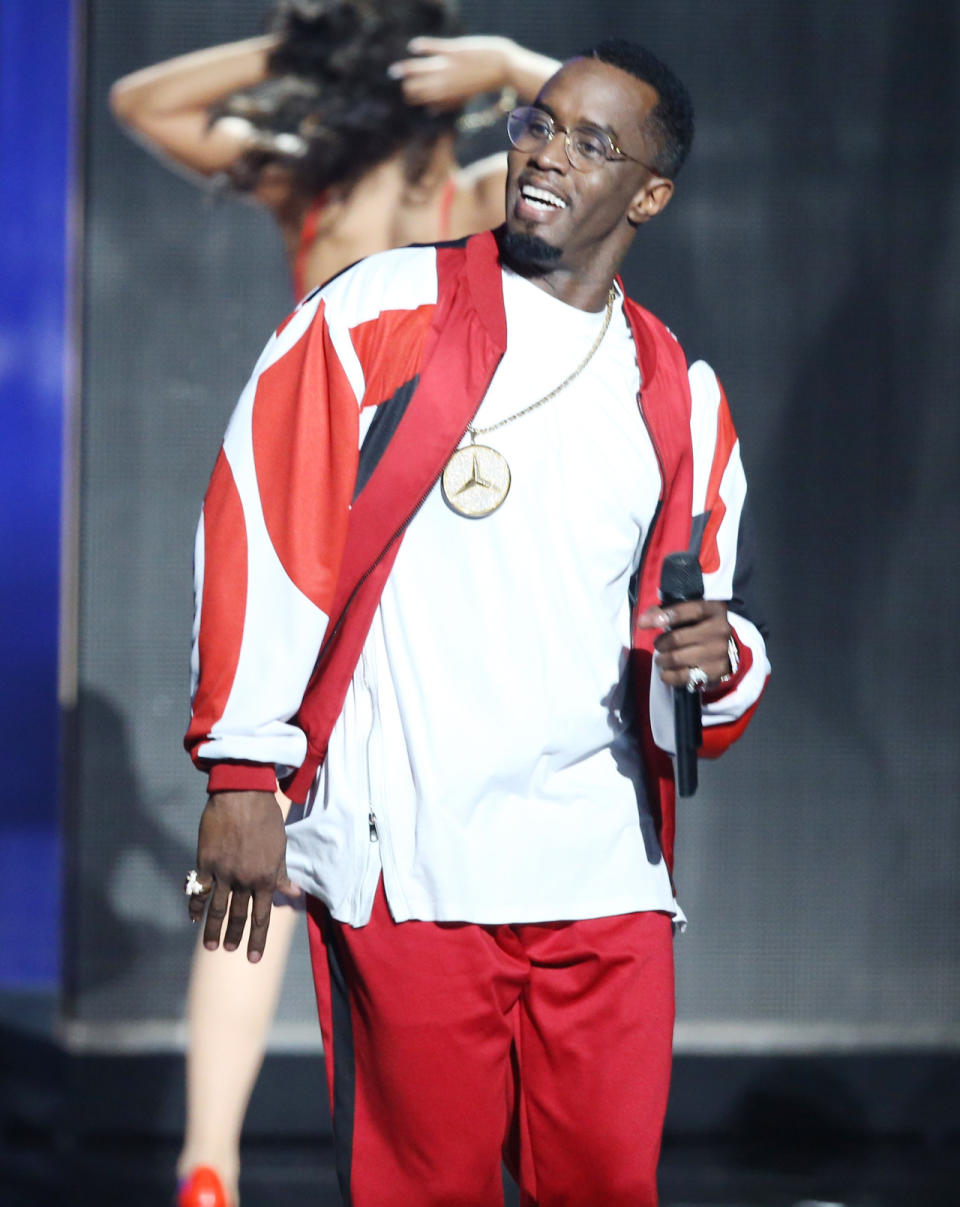 It’s reassuring to see that bomber jackets and bling are still part of the repertoire, but the nerdy frames are a new addition to Diddy’s look. As for his impeccably groomed hair and goatee — we’d expect nothing less from the dude who’s been known to get deskside mani/pedis.