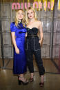 <p>The Fanning sisters rocked quite different styles at the Miu Miu show during Paris Fashion Week. Do you prefer Dakota’s chic satin dress or Elle’s sassy bustier and pants combo? (Photo: Getty Images) </p>