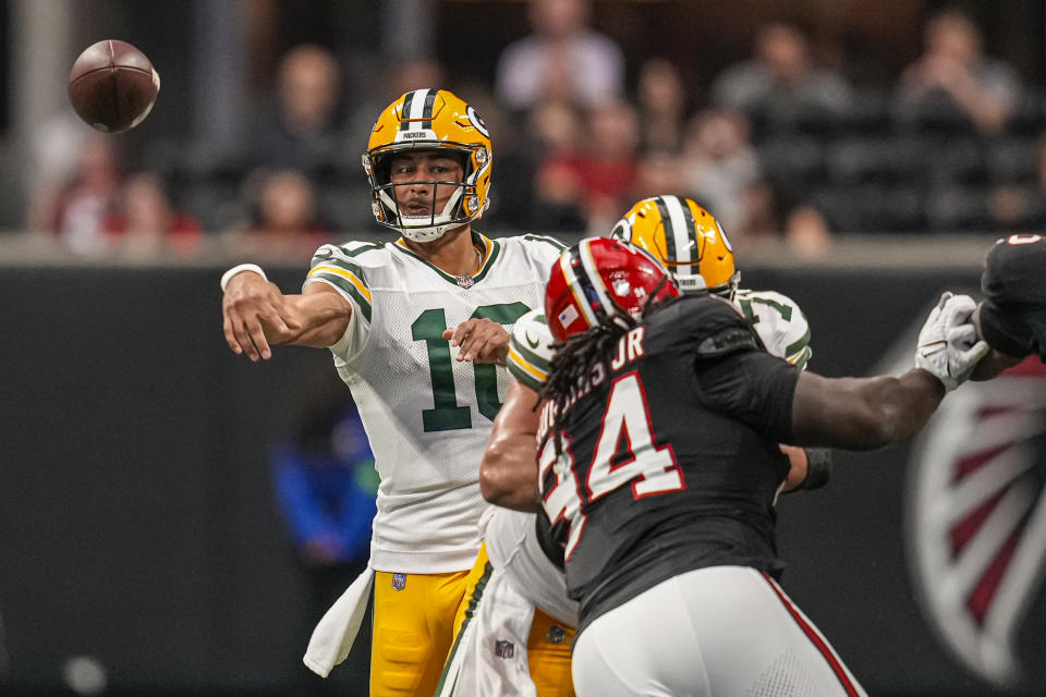 Sep 17, 2023; Atlanta, Georgia, USA; Green Bay Packers quarterback Jordan Love (10) passes around Atlanta Falcons defensive tackle <a class="link " href="https://sports.yahoo.com/nfl/players/32509" data-i13n="sec:content-canvas;subsec:anchor_text;elm:context_link" data-ylk="slk:Albert Huggins;sec:content-canvas;subsec:anchor_text;elm:context_link;itc:0">Albert Huggins</a> (94) at Mercedes-Benz Stadium. Mandatory Credit: Dale Zanine-USA TODAY Sports